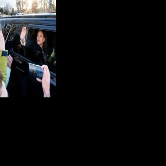 Venezuelan opposition leader Maria Corina Machado waves to supporters from her car as she departs the US Capitol after meeting with US senators on January 15, 2026