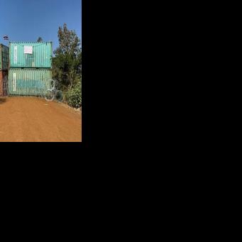 Containers and barbed wire are seen blocking a road in Chouk Chey village in early January, following military clashes between Cambodia and Thailand