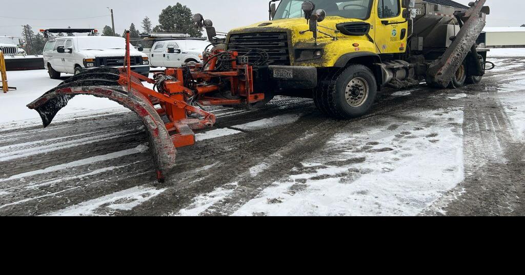 Plows hit Spokane roads as consistent snow falls throughout the region