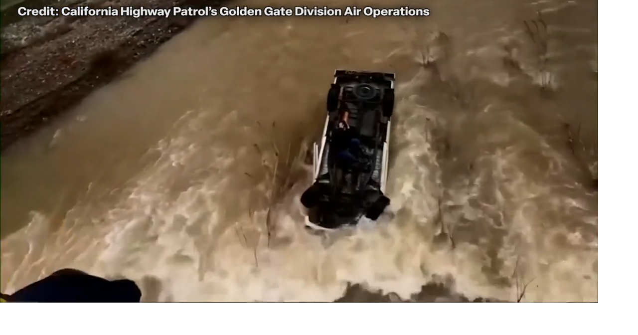 First responders in California save woman trapped on top of her