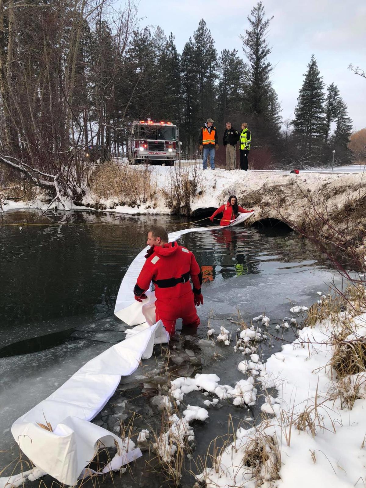Hazmat Crews Clean Up After A Car Drives Into A Creek Regional Khq Com