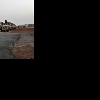 American soldiers prepare to board a cargo plane in Niamey on June 7, 2024 as US forces leave Niger
