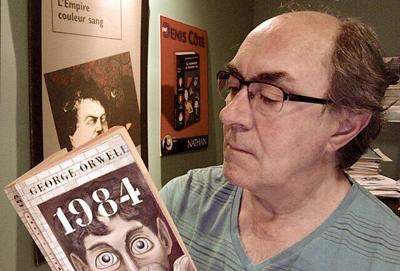 Man reads 1984