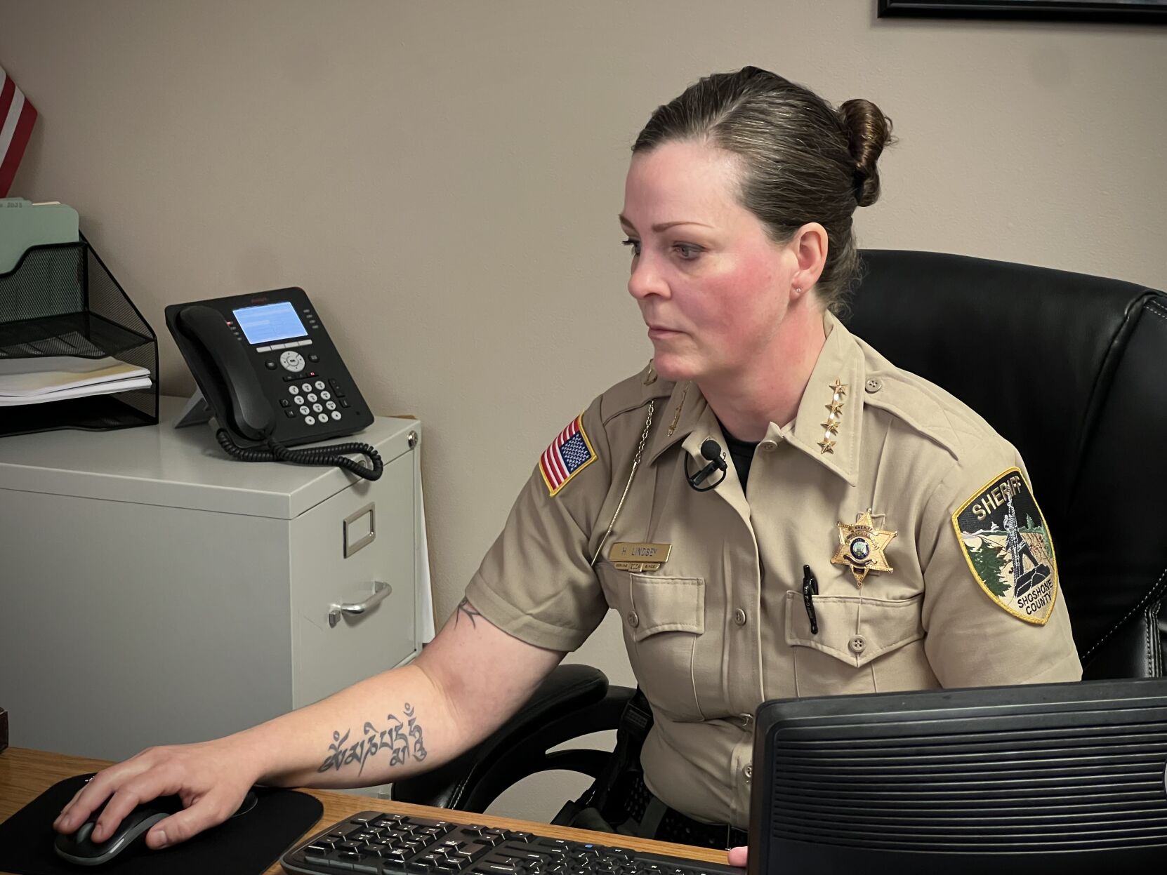 Shoshone County Sheriff Holly Lindsey Working At Her Desk After A ...