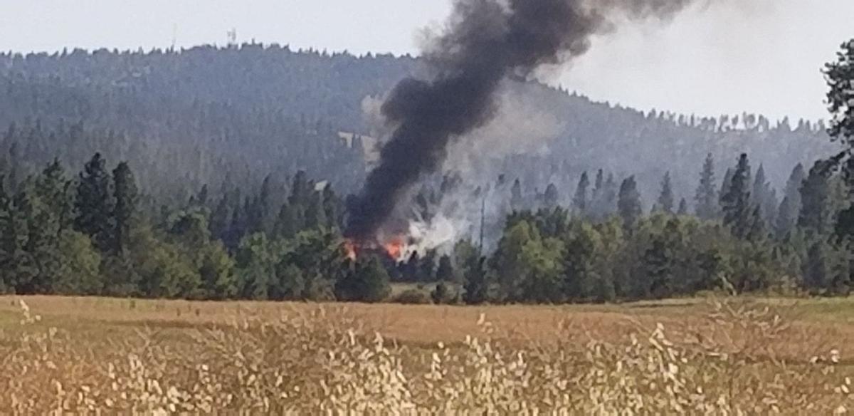 House fire near Deer Park sparks brush fire and several spot fires