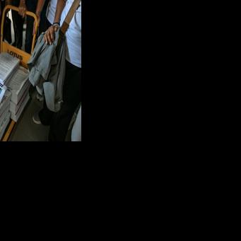 A photo of Sara Duterte is seen as members of civil society groups file an impeachment complaint against the Philippine vice president at the House of Representatives