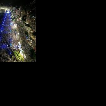 Crowds pack Copacabana Beach in Rio de Janeiro, Brazil during Shakira's concert