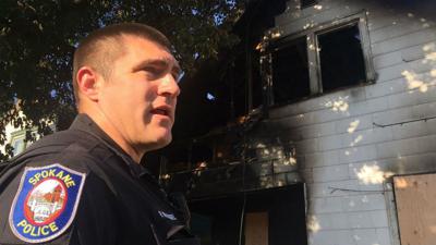 Spokane police officer helps save man who jumped from window to escape fire