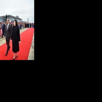 Chinese Foreign Minister Wang Yi (C) is welcomed by North Korean Foreign Minister Choe Son-hui (R) upon arriving on a two-day visit at Pyongyang International Airport on April 9, 2026.
