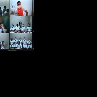 This handout image released by El Salvador's Attorney General's Office on April 1, 2026, shows a mass trial of alleged gang members held over video call