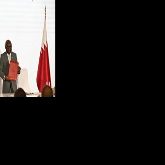 Officials from the rival DR Congo government and the Rwanda-backed M23 movement stand with a Qatari negotiator at the signing of a new roadmap seeking to establish a permanent peace in devastated eastern DRC