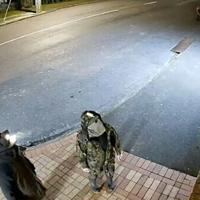 New Zealand police released rare images Friday apparently showing a fugitive father whose nearly four years on the run with his children have gripped the country