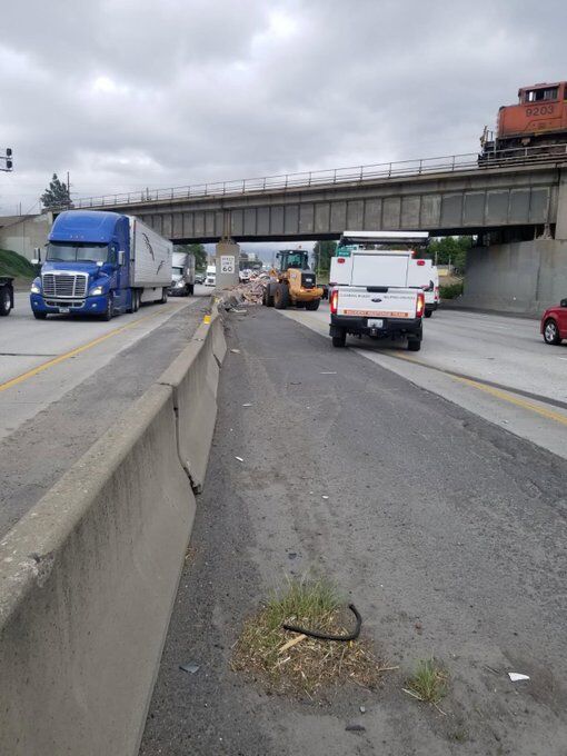 Semi truck on its side after crash on I-90 eastbound near Latah Creek ...