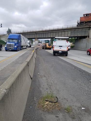 Semi truck on its side after crash on I-90 eastbound near Latah Creek ...
