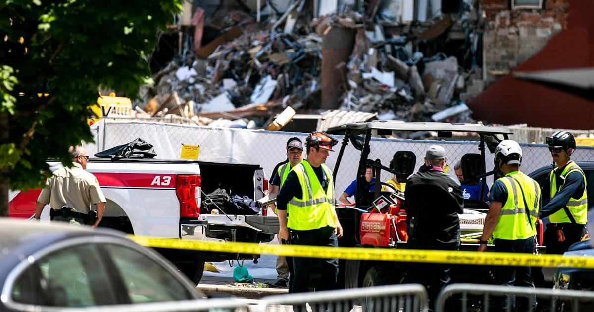 Iowa officials weigh further searches of precarious partially collapsed apartment building as 5 residents remain unaccounted for