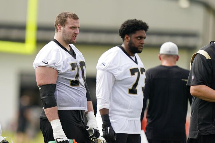 Photos: North Iowan Trevor Penning going through first NFL training camp  with Saints, Local Sports