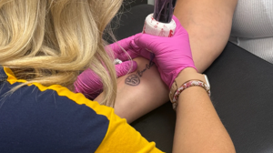 Fans in Rochester-Area Communities Get Tattoos Inspired by Brewers Run