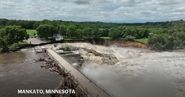 More rain possible in deluged Midwest as flooding breaches levees in ...
