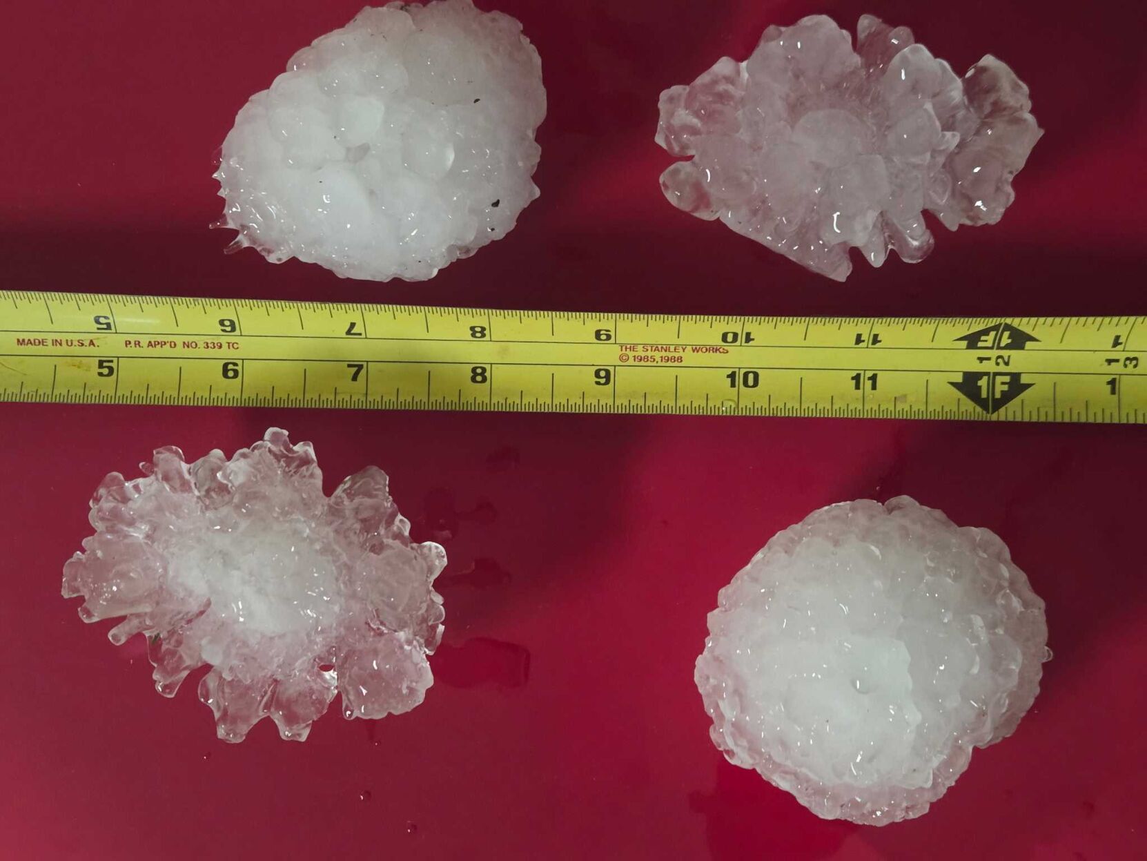 Dangerously large hail falls as severe storms develop for second ...