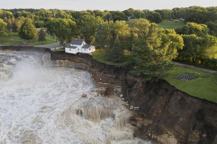Swollen river claims house next to Minnesota dam as flooding and extreme  weather grip the Midwest | News | kimt.com
