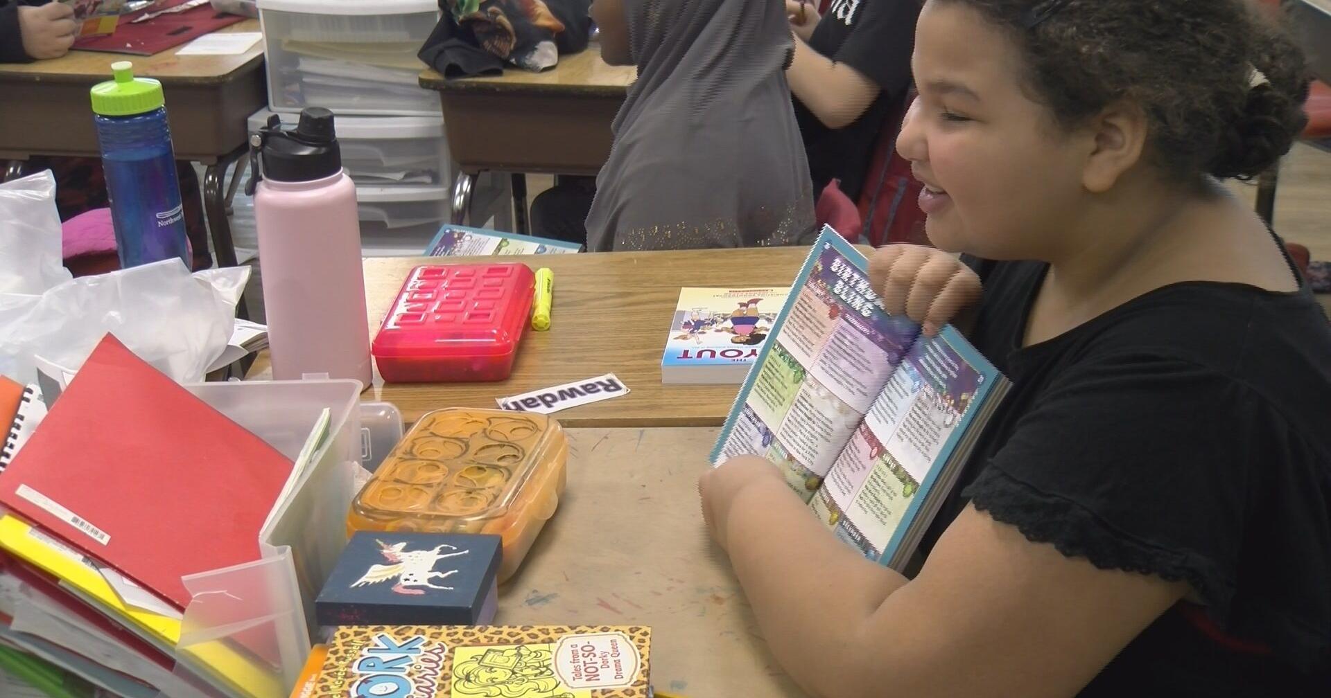 Greater Rochester Rotary Club passes out books to third graders - Vimarsana News