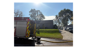 Rochester Firefighters Extinguish Backyard Fire on Melrose Street