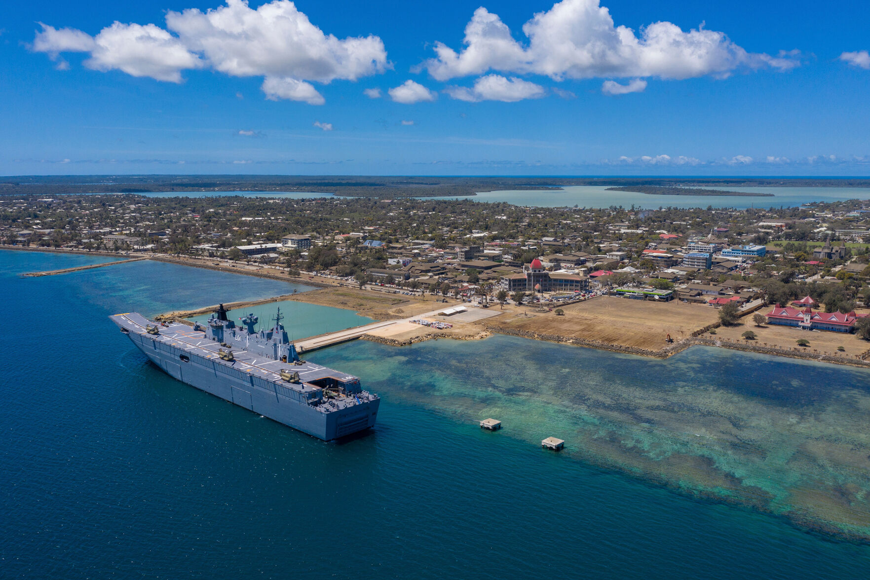 Disaster-hit Tonga goes into lockdown after recording first local