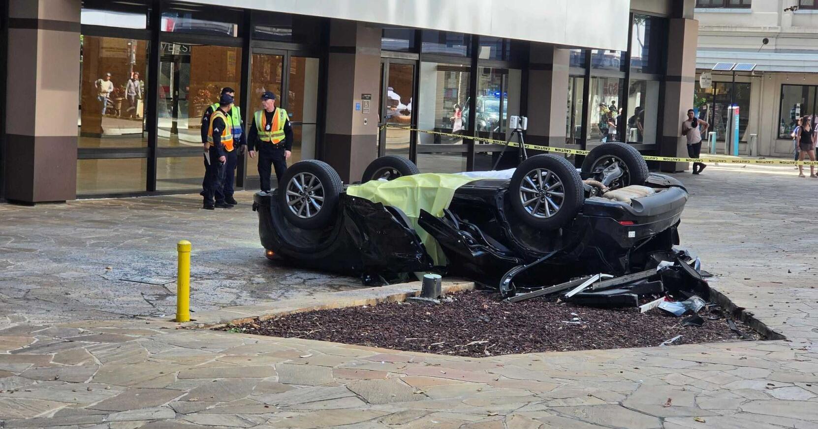 Woman dies after car launches from Downtown Honolulu parking structure