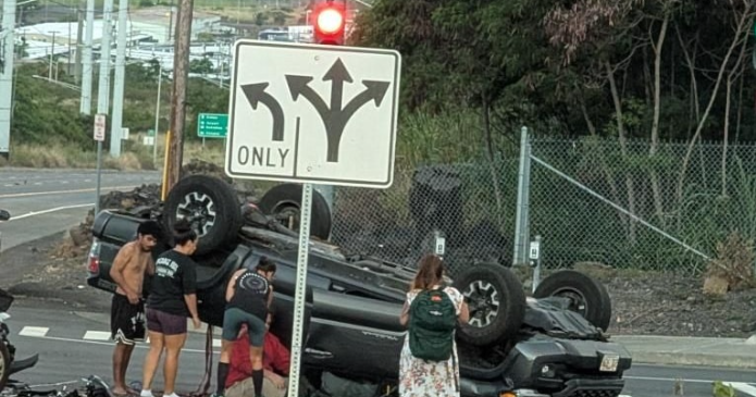 Driver arrested after T-bone collision in Kona that flipped truck ...