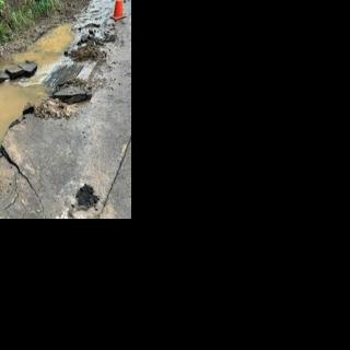 Fallen boulder from Anahola landslide damages road, causes temporary ...