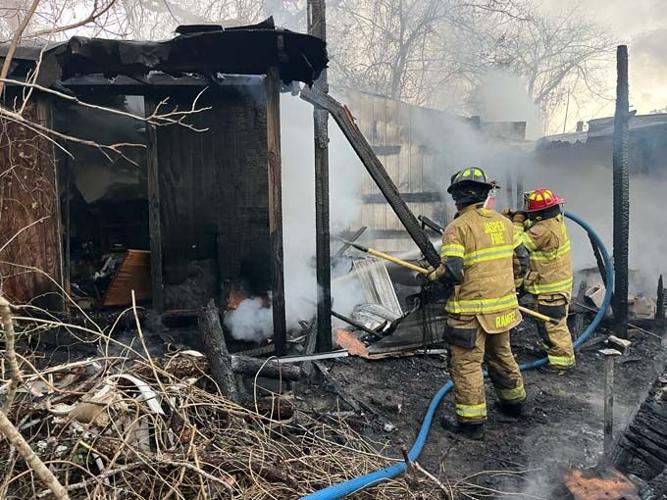 Friday evening fire destroyed a large storage shed and other out ...