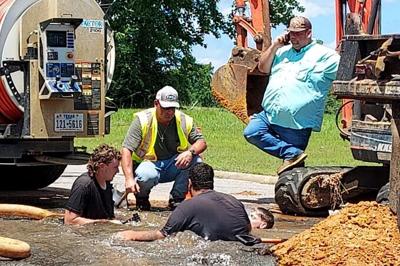 City of Jasper workers doing whatever it takes to get the job done ...