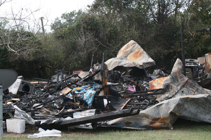 Flames destroy mobile home | Local News | kjas.com