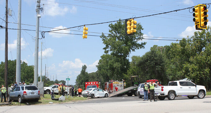 Three people injured in a crash on Highway 96 North at Martin Luther ...