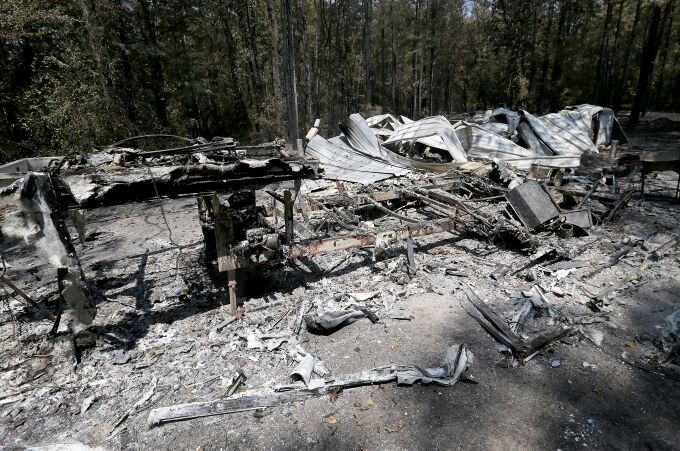 Fire scene photos capture the terrible aftermath of the blaze and the ...