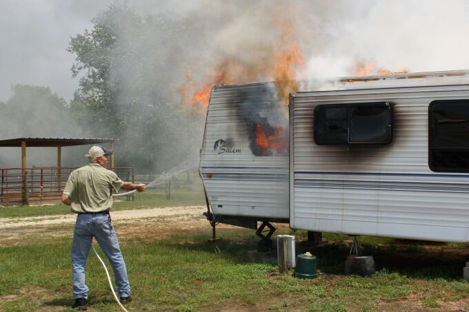 Fire destroys a travel trailer north of Jasper | Local News | kjas.com