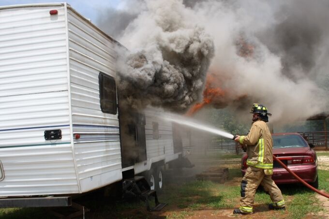 Fire destroys a travel trailer north of Jasper | Local News | kjas.com