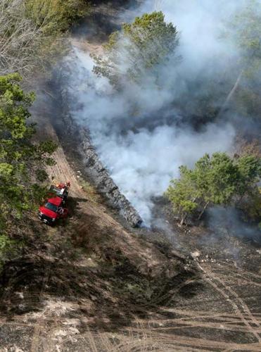 Controlled burn gets out of control in high winds | Local News | kjas.com