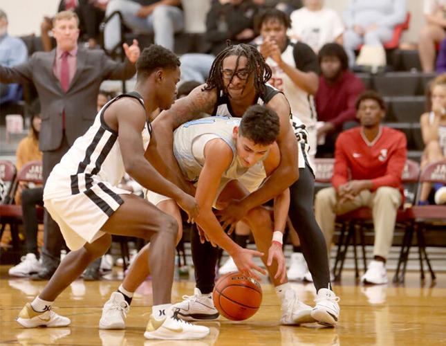Jasper takes on Lumberton basketball action Local Sports