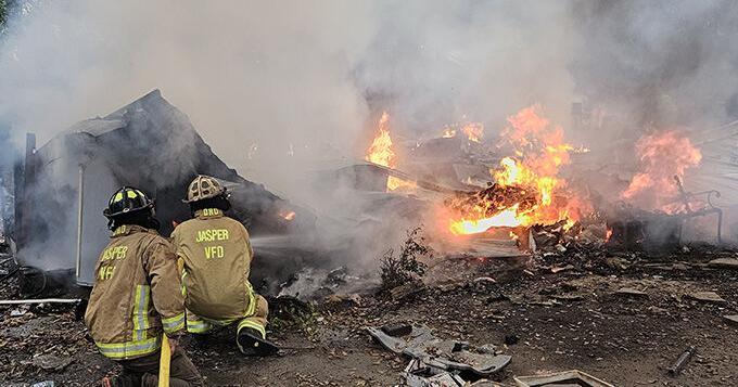 Fire destroys mobile home just west of town | Local News | kjas.com