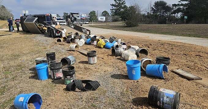 No injuries reported after pickup truck and trailer flips over on Highway 96 north