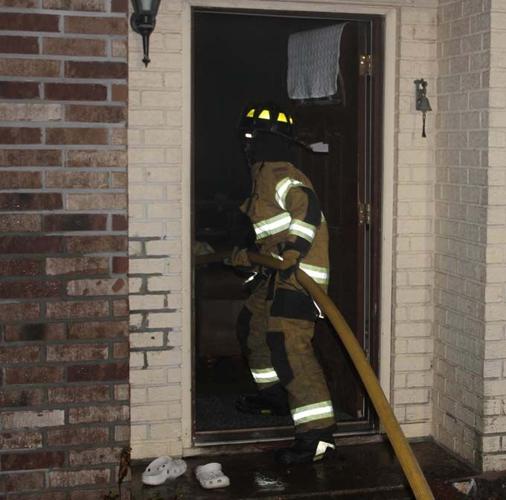 Local firemen respond to burning home on James Street. | Local News ...