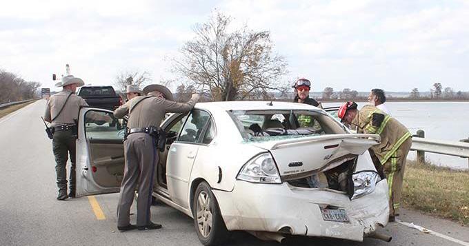 Vehicle rear ends car on Dam B Bridge and keeps going
