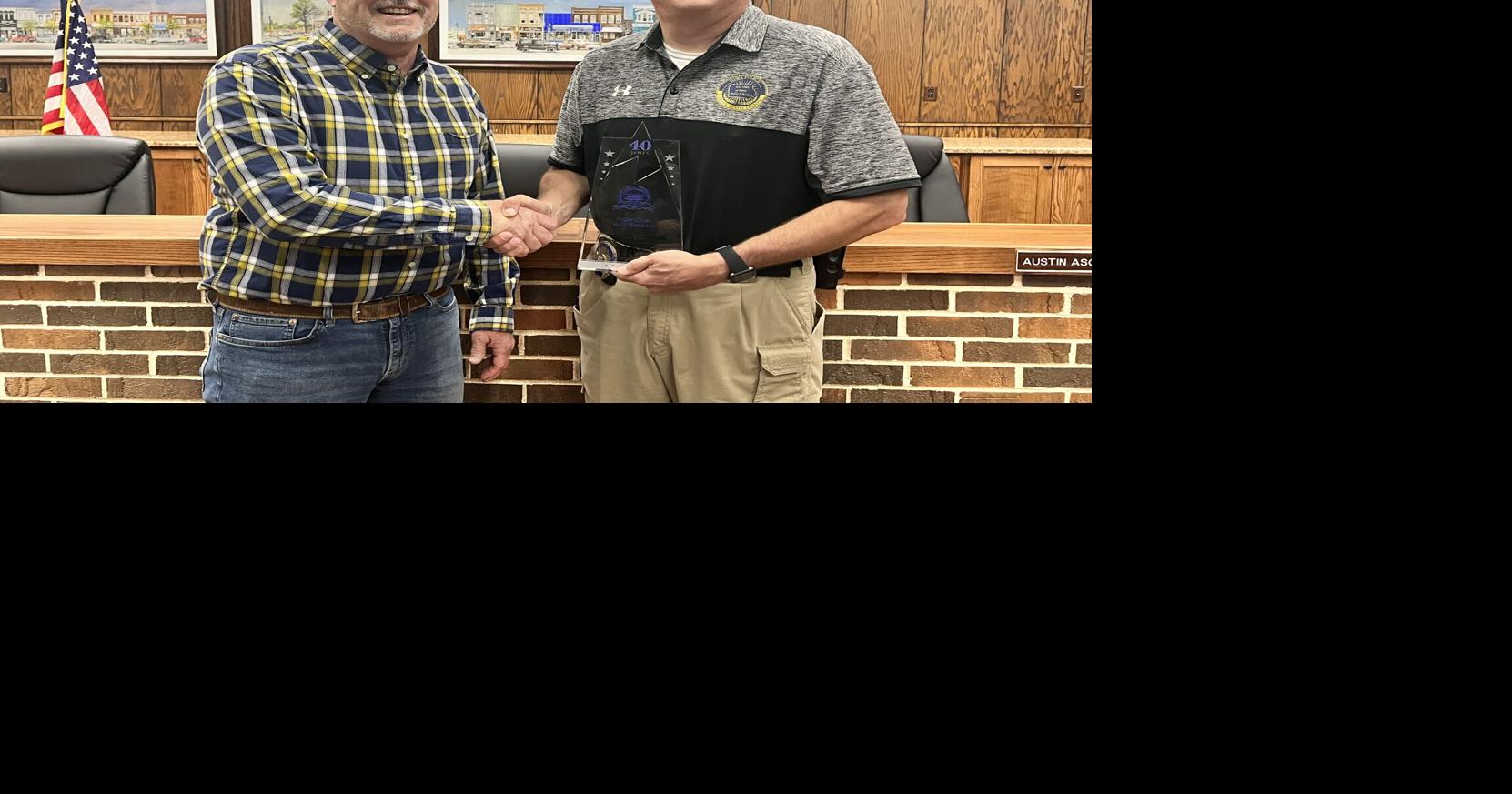Brothers recognized for 40 years of service in Clarinda Police