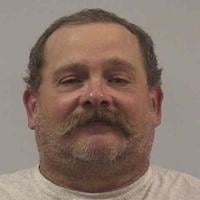 Man charged with making threat to Fremont-Mills School Board member