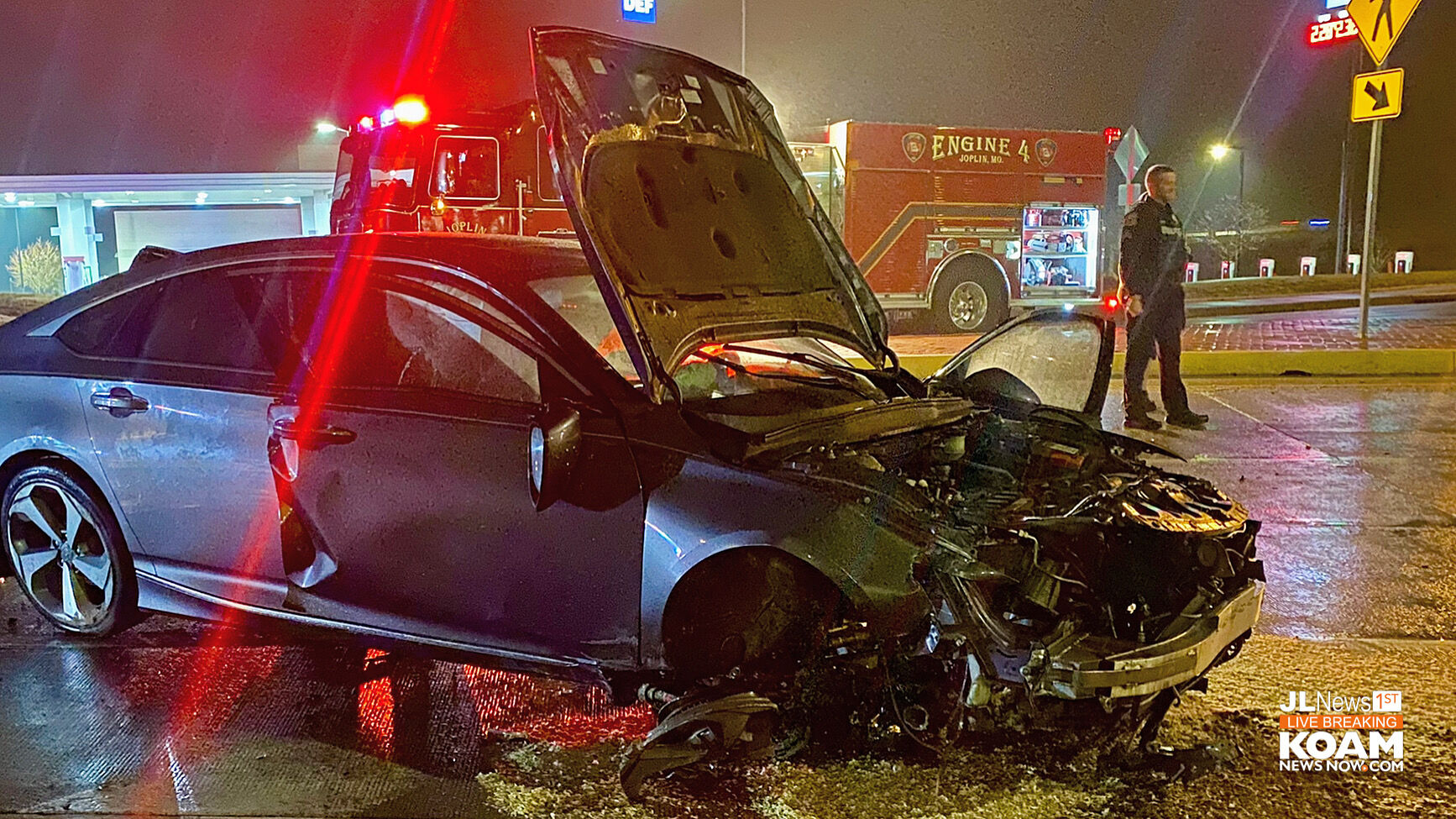 Car ramps roundabout crashes out Witnesses say car was doing 100