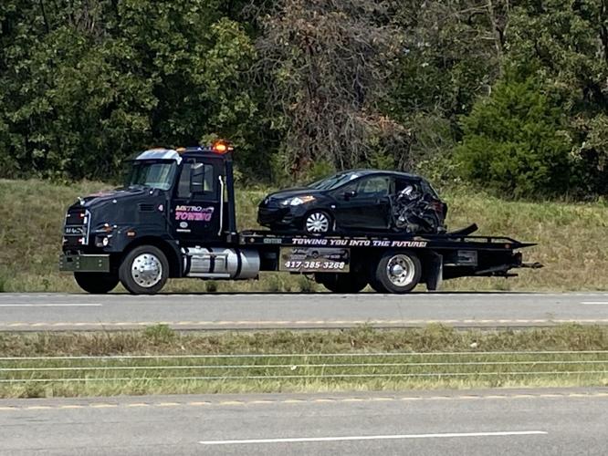 Tractor trailer rear-ends vehicle in slowing traffic at highway speeds ...