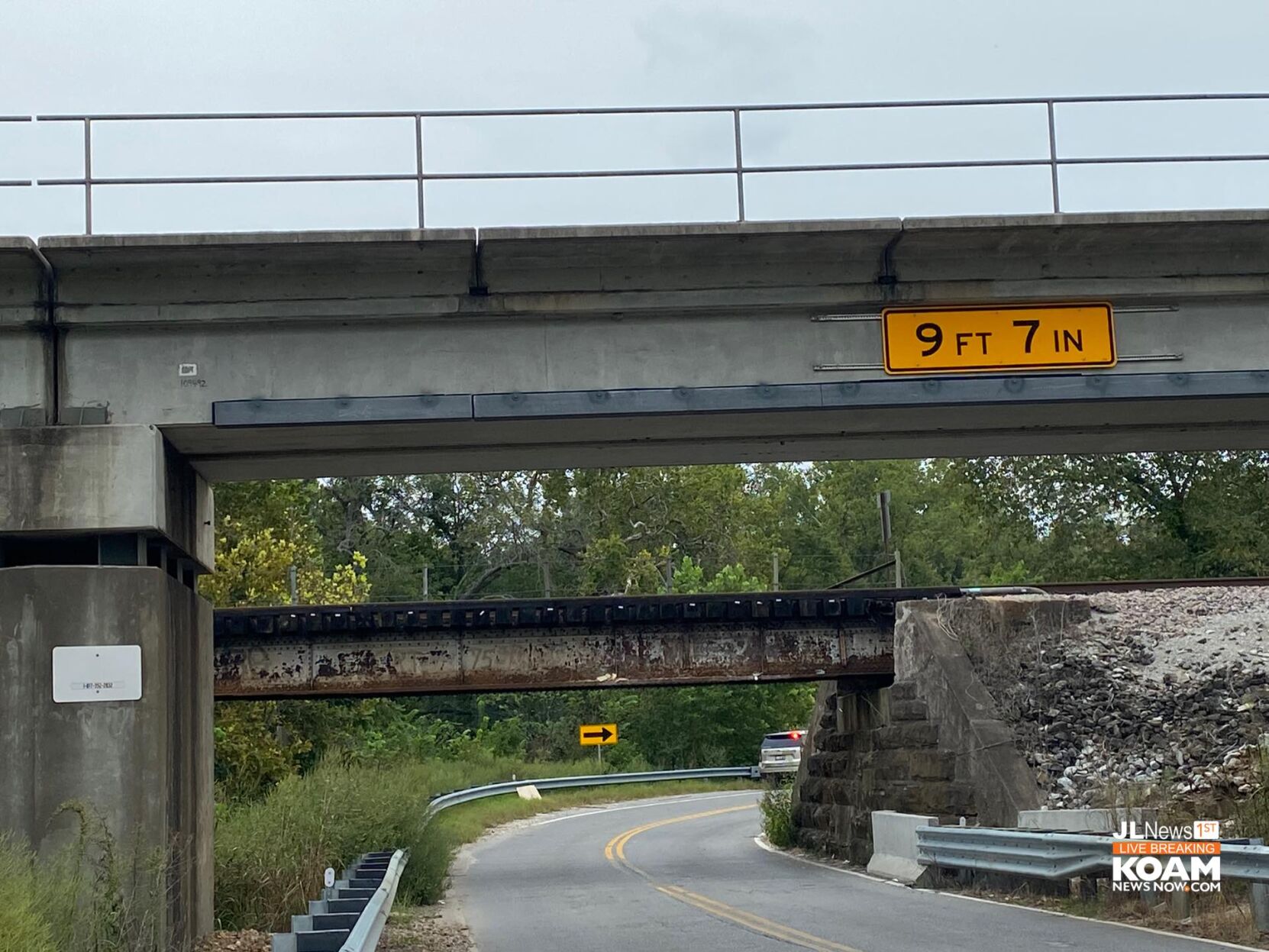 Box truck destroyed crossing under 9'7