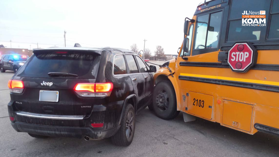 SUV collides with school bus loaded with kids | Joplin News First ...