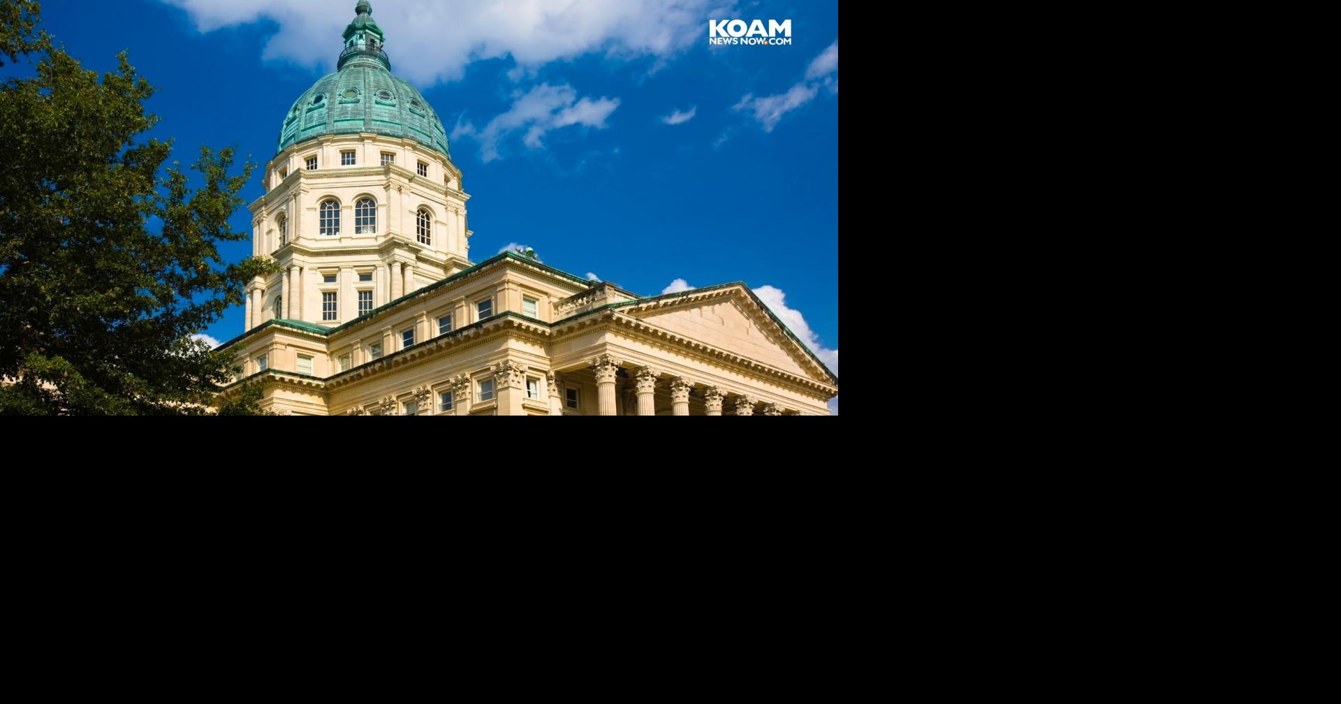 Kansas governor signs bill banning cell phone use in school and work zones